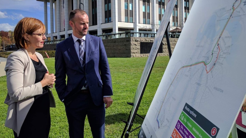 Andrew Barr and Meegan Fitzharris look at the proposed routes of Canberra's light rail stage two