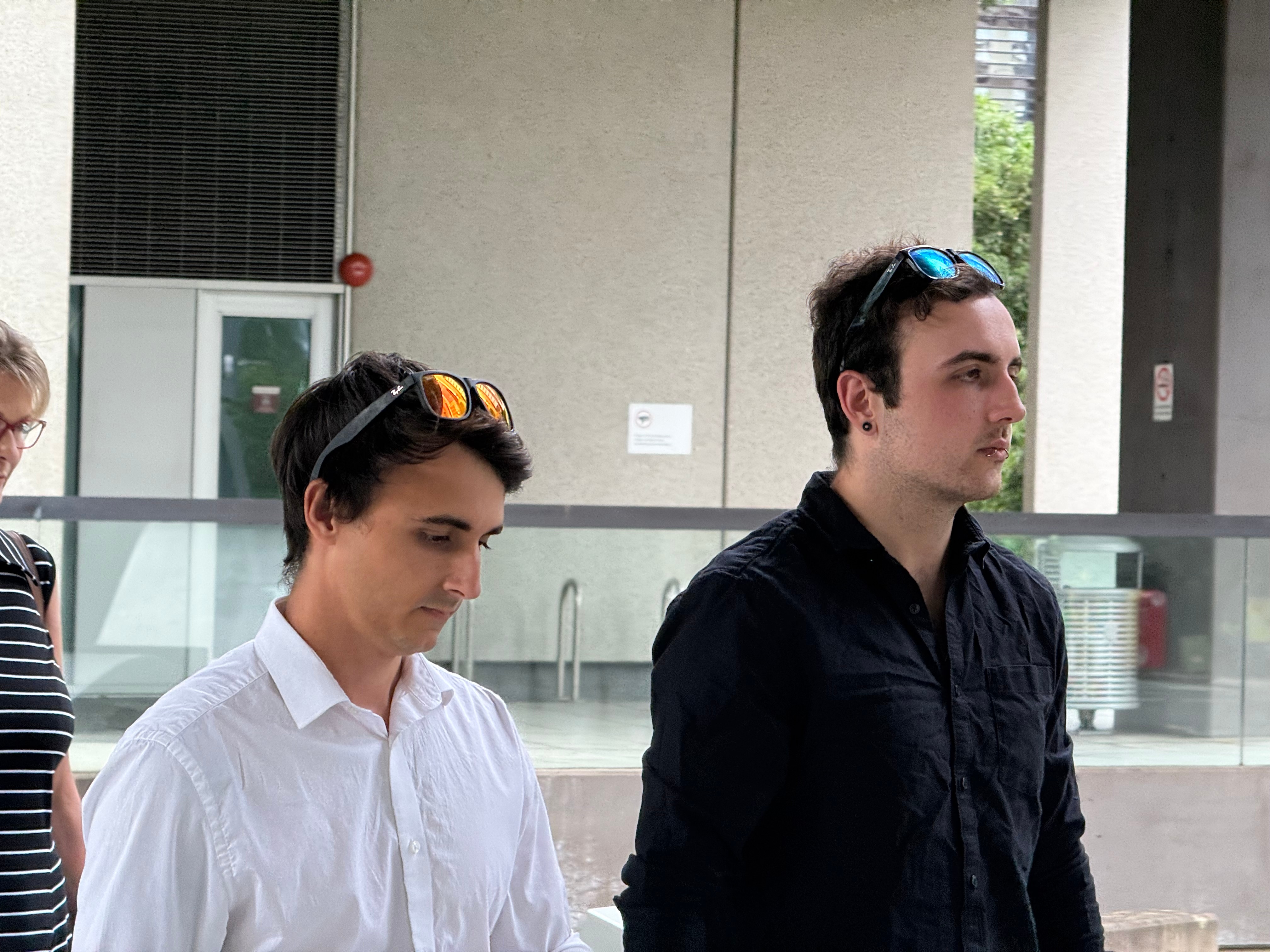 two men leaving court