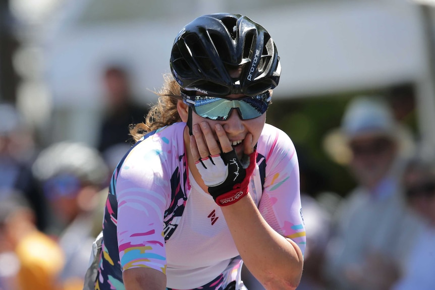 Sarah Gigante puts her hand to her face as she finishes a race in Mt Buninyong.