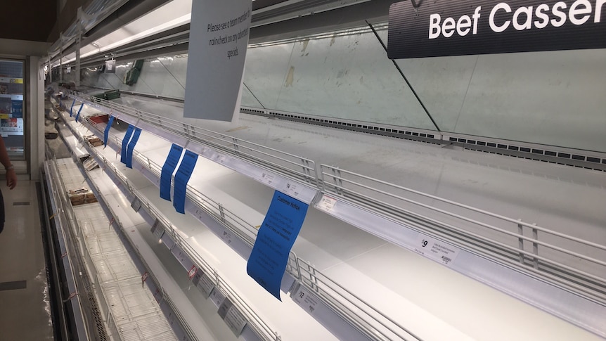 Empty meat shelves at a Coles supermarket in Darwin.