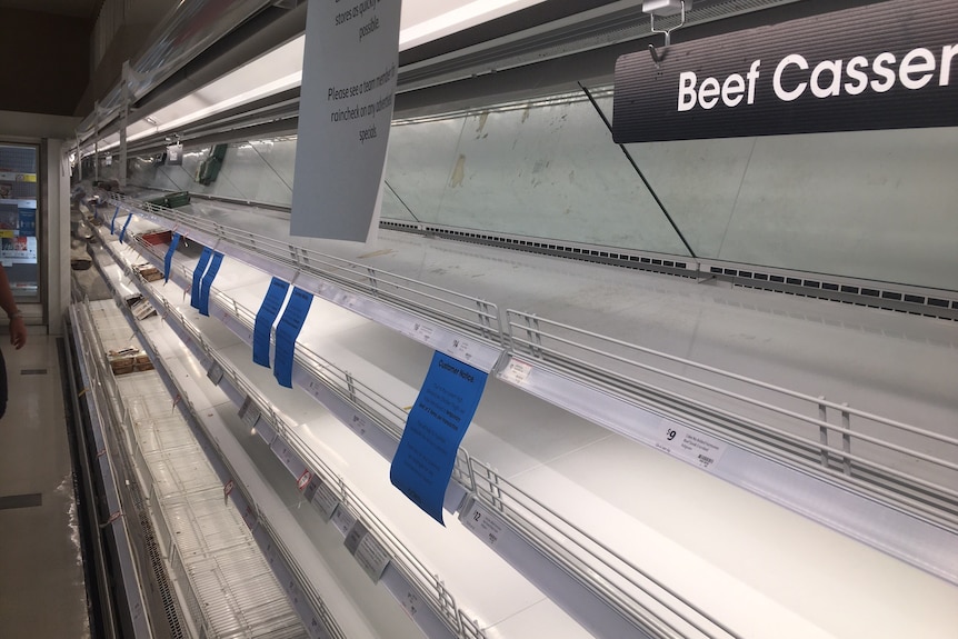 Empty meat shelves at a Coles supermarket in Darwin.