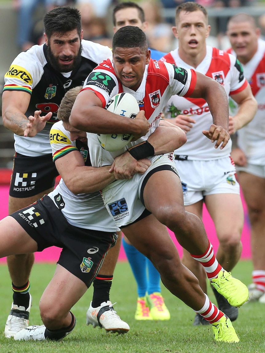 Nene MacDonald cops a tackle for the Dragons