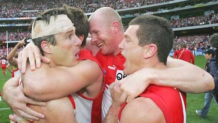 The Swans celebrate their grand final victory.