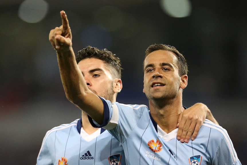 Alex Brosque celebrates a goal for Sydney FC