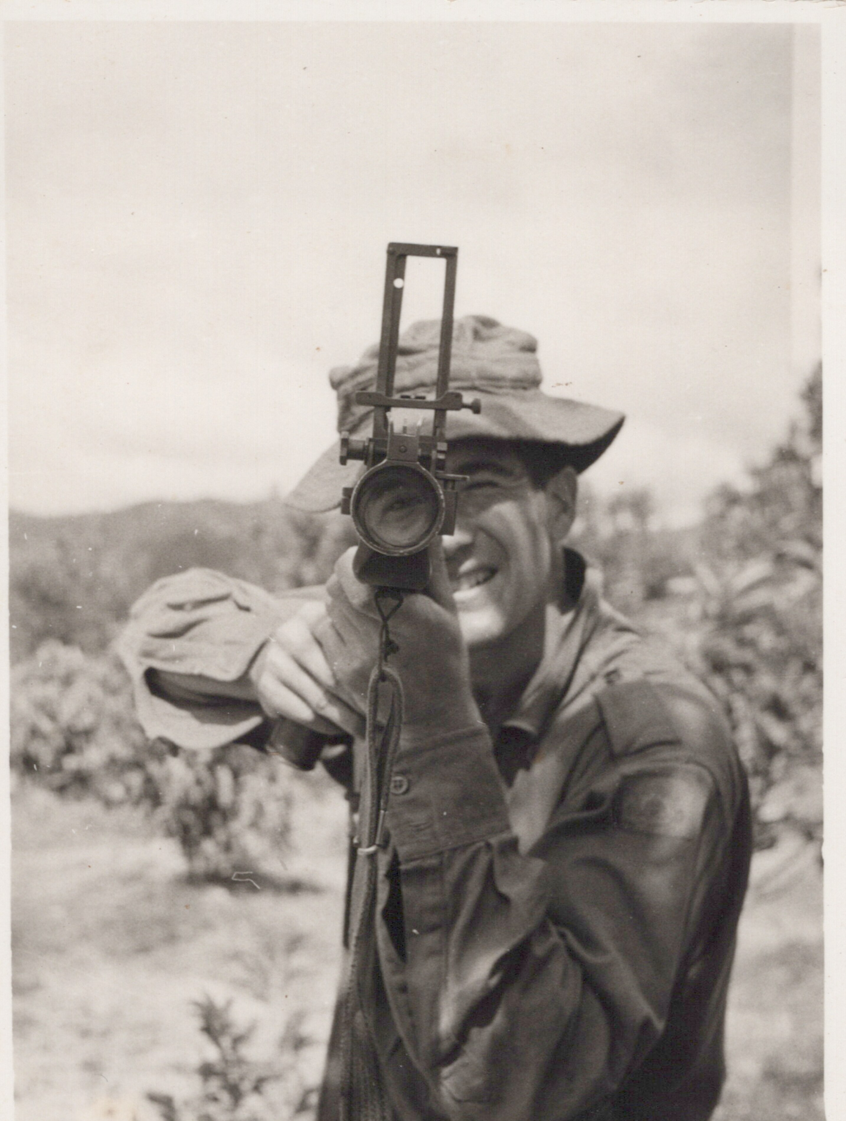 A man pointing a weapon.