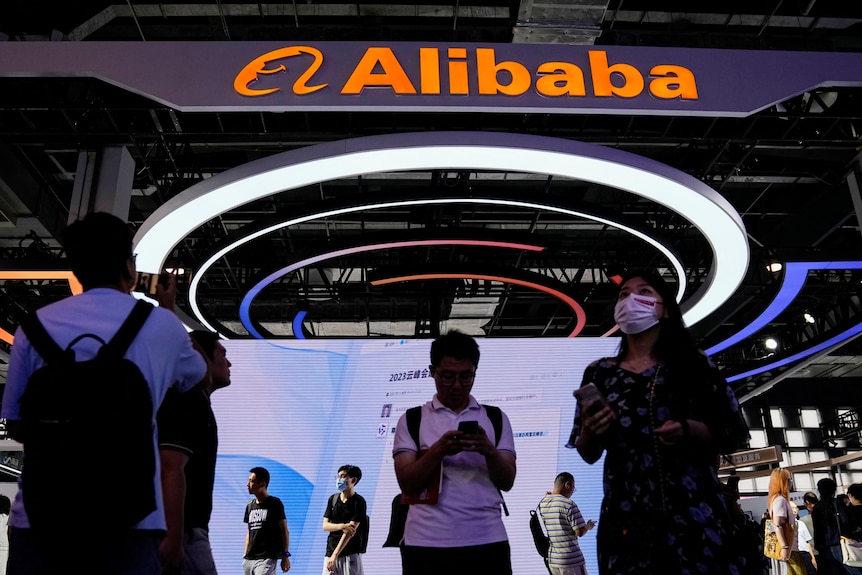 A orange, neon sign of the name, Alibaba