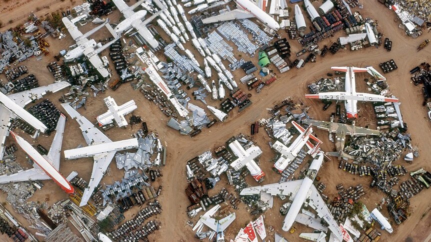 An aerial shot of an airplane scrapyard.