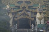Police block the eastern gate of the Shwedagon Pagoda in the Burmese city of Rangoon.