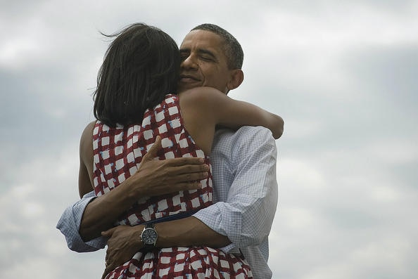 Barack and Michelle Obama embrace