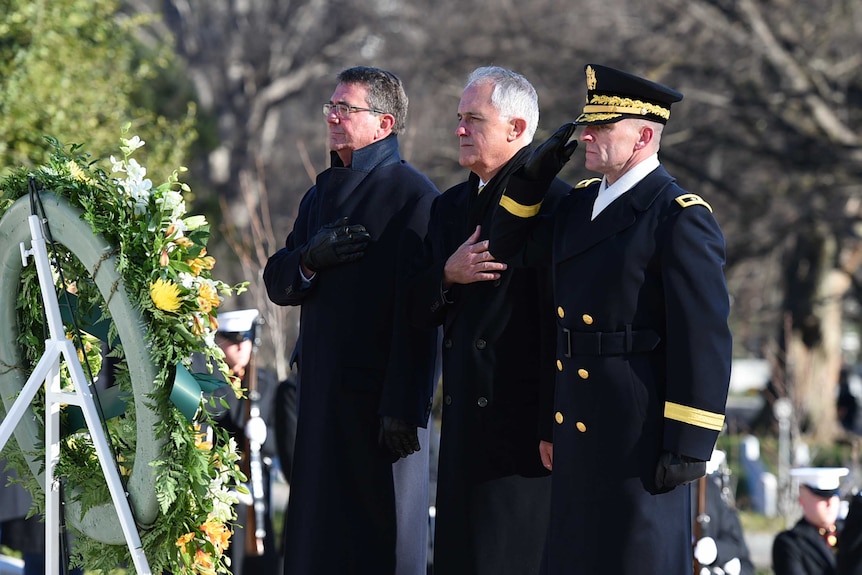 Malcolm Turnbull takes part in a wreath laying at Arlington