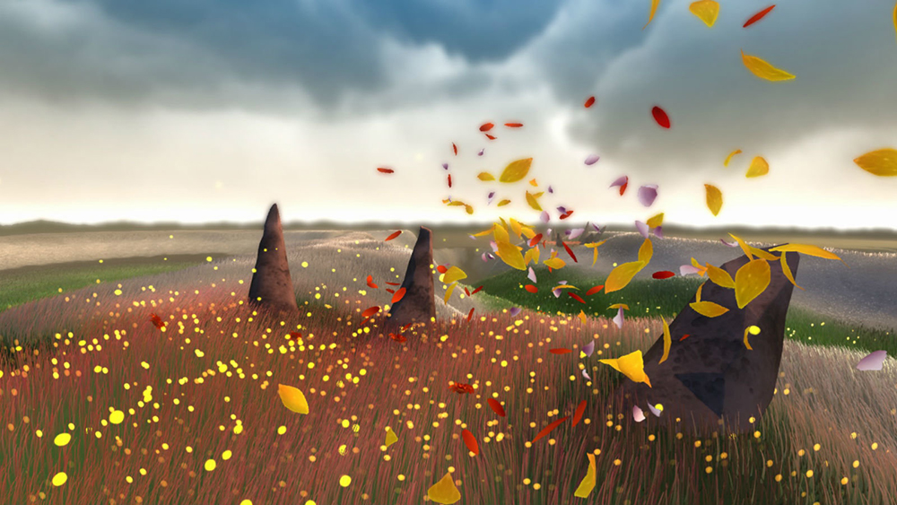 In a scene from a video game flower petals fly through the air and over a grassy landscape on a a dark cloudy day.