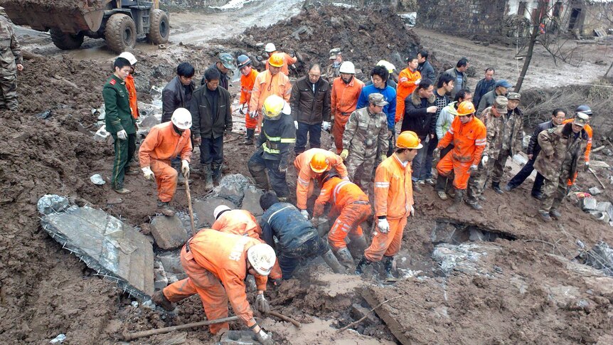 Rescuers search for China landslide victims