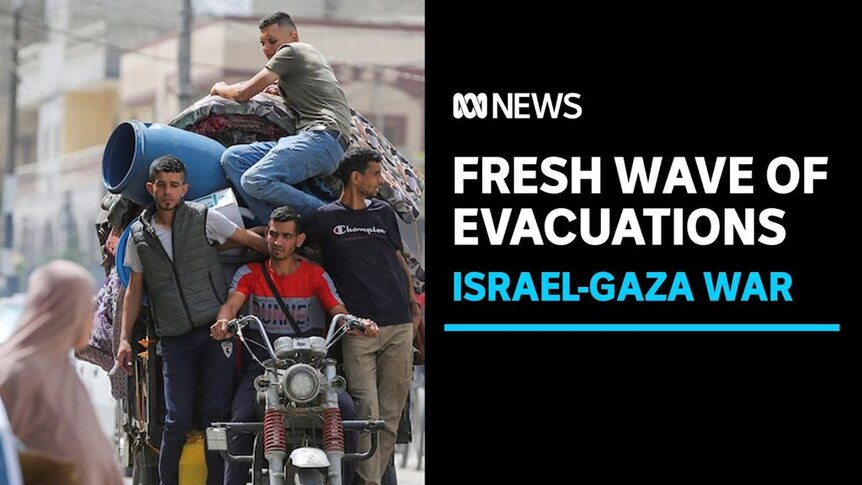 Fresh Wave of Evacuations, Israel-Gaza War: Four men sit on top of a small motor vehicle stacked with belongings.