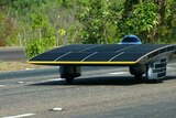 Cars in the World Solar Challenge race from Darwin to Adelaide have been stopped because of bushfires in Central Australia.