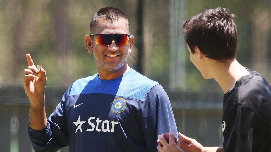 MS Dhoni gestures to a young bowler in the nets at Adelaide Oval on December 8, 2014.