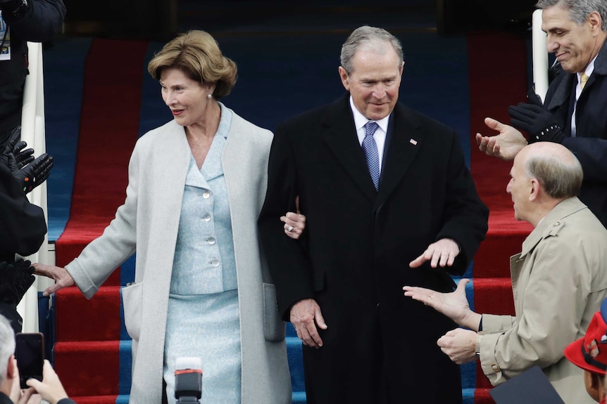 Former President George W. Bush and his wife Laura