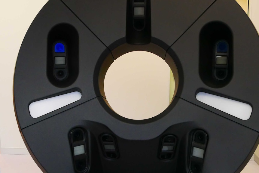 A circular plastic machine holds dozens of 25 megapixel cameras