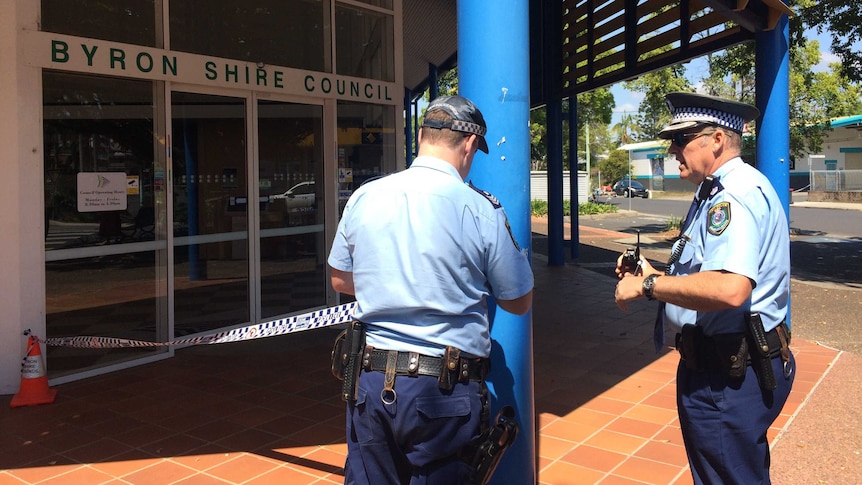Police creating the exclusion zone at Byron Shire Council.