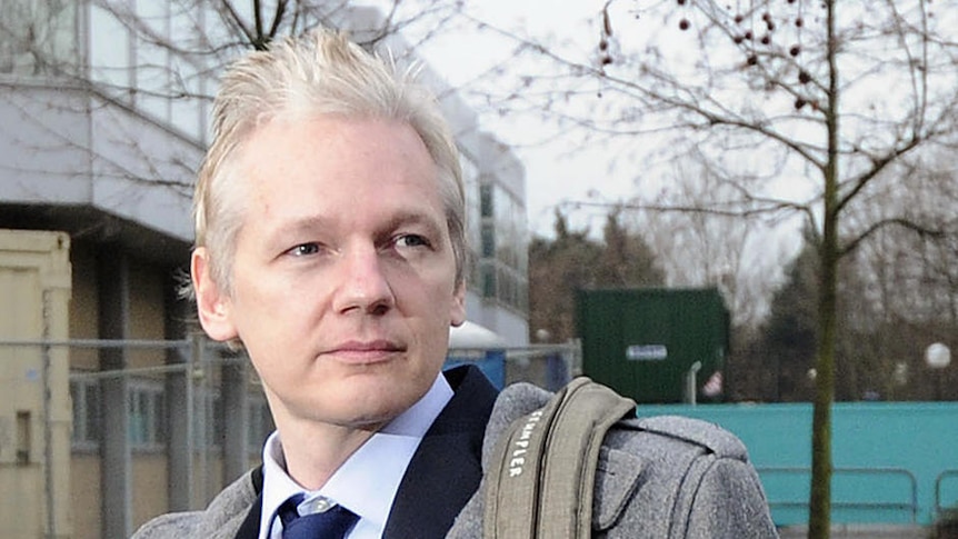 Julian Assange arrives at court in London