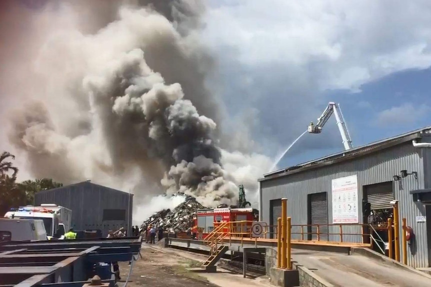 Firefighters battling a large blaze at sheet metal factory in Cairns.