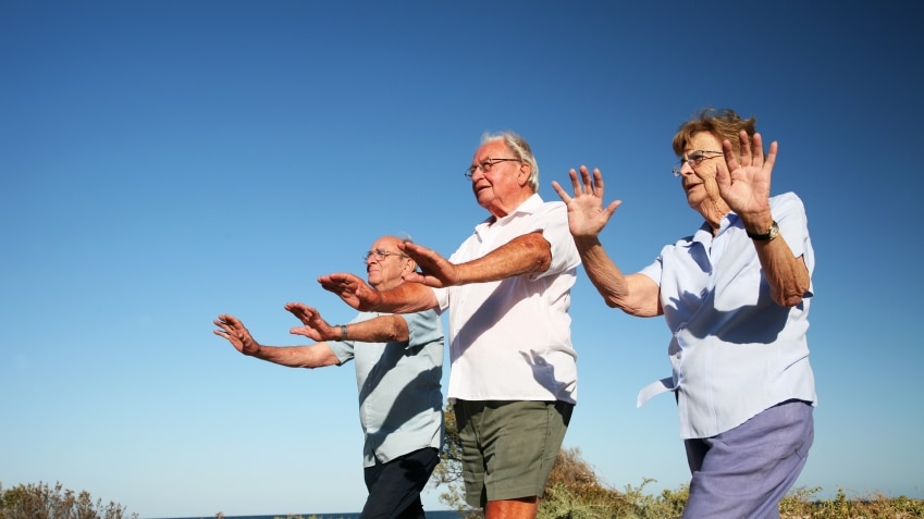 Older people exercising together