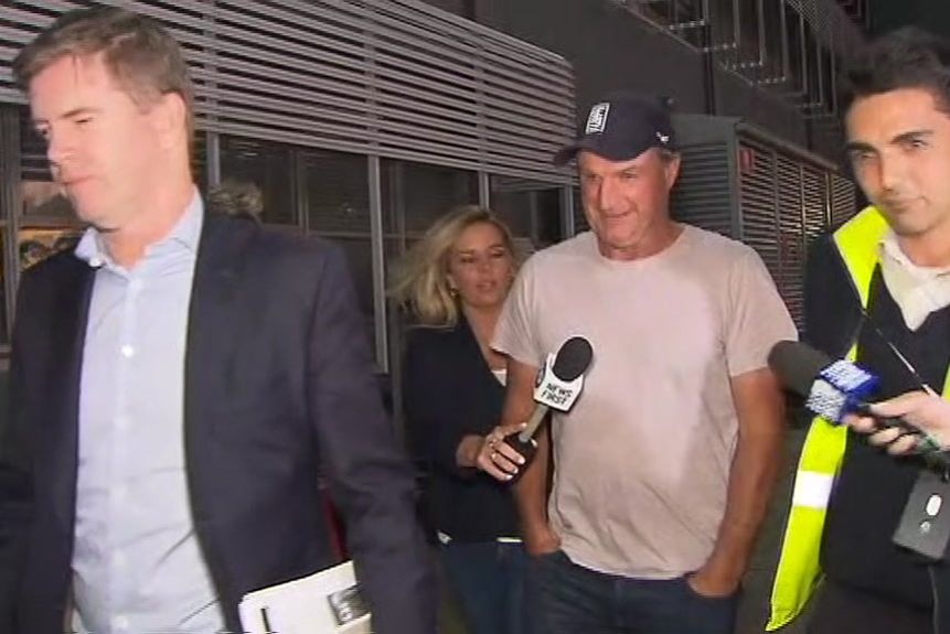Darren Weir leaves Racing Victoria's headquarters after being questioned by officials In 2019.