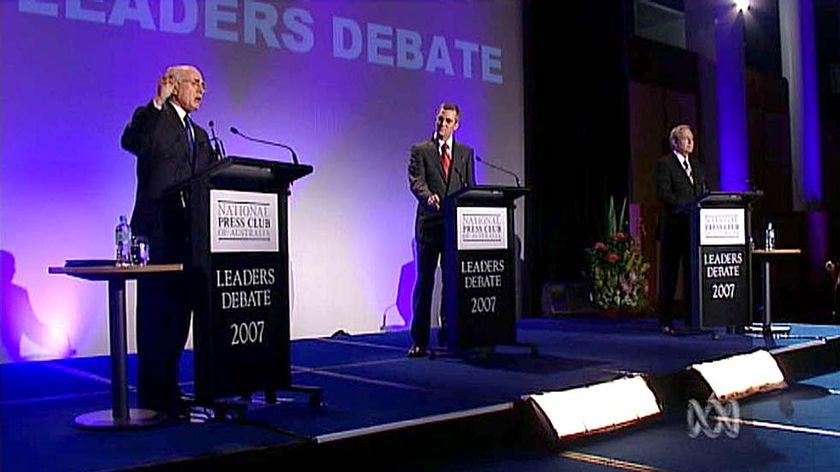 Outlining their aims:  John Howard and Kevin Rudd at the leaders' debate.