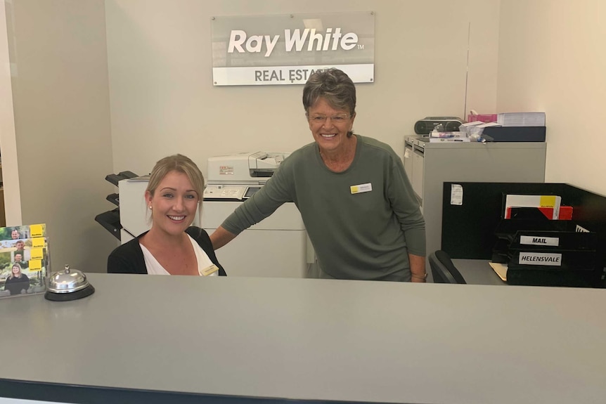 Oxenford Ray White real estate co-principal Sally Hynes (Right) with staff at her office.
