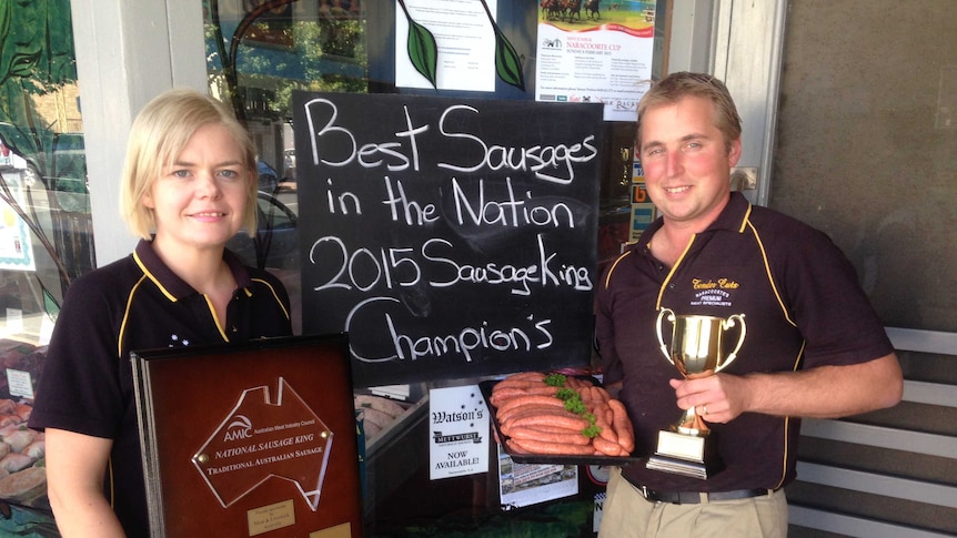 Sophie and Shaun Watson put a 'best snag' sign in the window of their butcher shop.