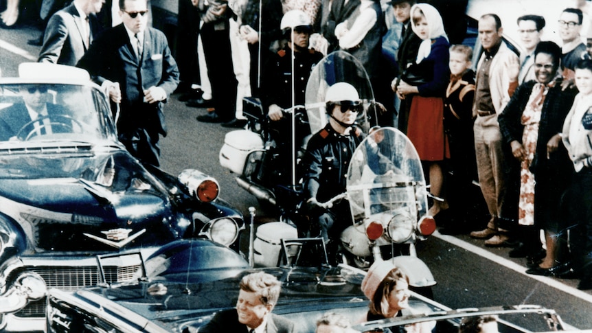 John F Kennedy's motorcade in Dallas, Texas before his 1963 assassination