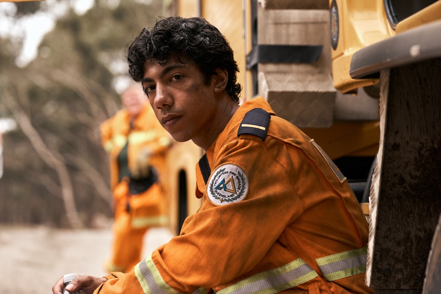 An actor in a fire brigade uniform.