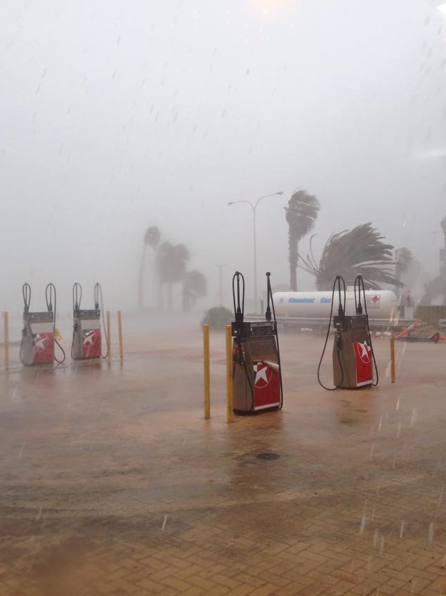 Rain pelts down on petrol bowsers at Shark Bay