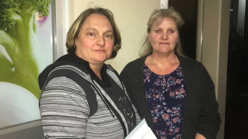 Two women standing outside the Oberon Council meeting.