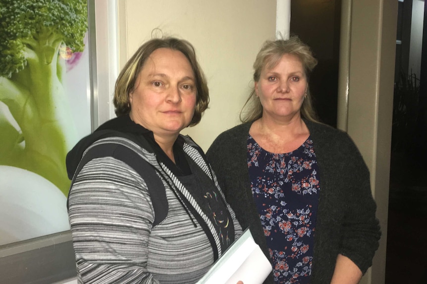 Two women standing outside the Oberon Council meeting.