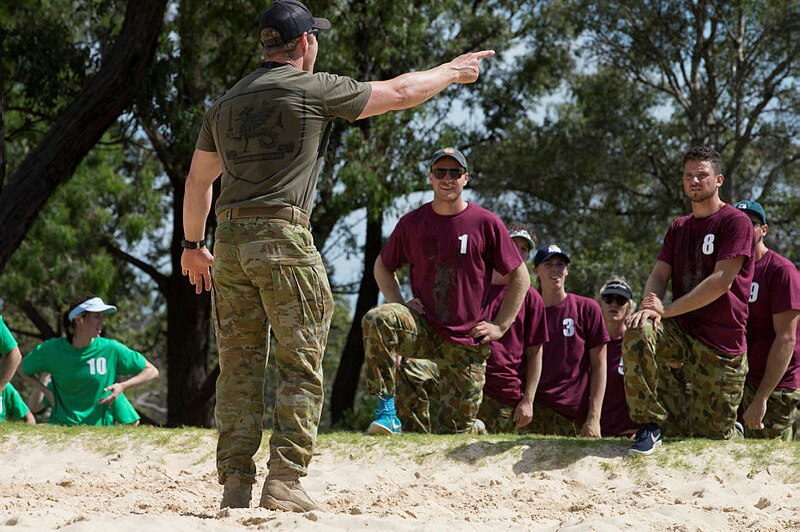 An Australian Army soldier barks orders to athletes and coaches taking part in the Gold Medal Ready program