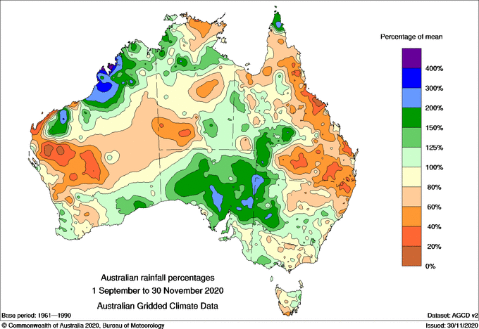 Map of Australia, green through SA and the NW, indicating above average rain but orange indicating below average E QLD and mid W