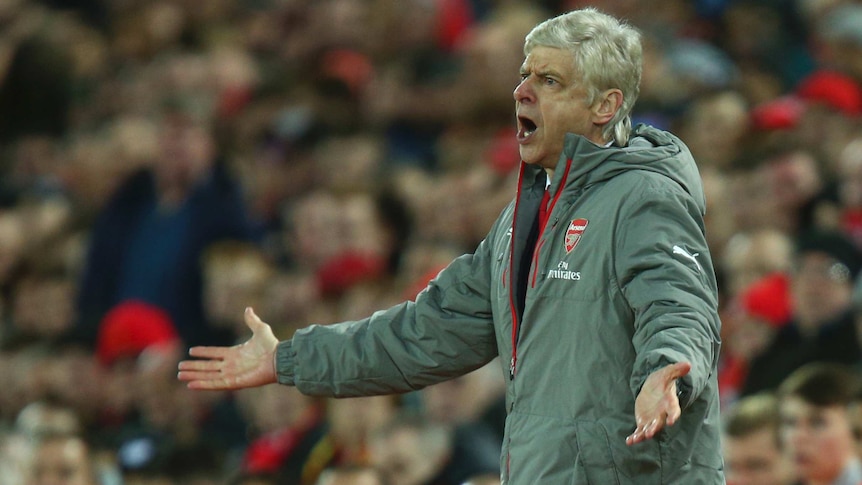 Arsenal manager Arsene Wenger reacts to a referee decision against Liverpool at Anfield.