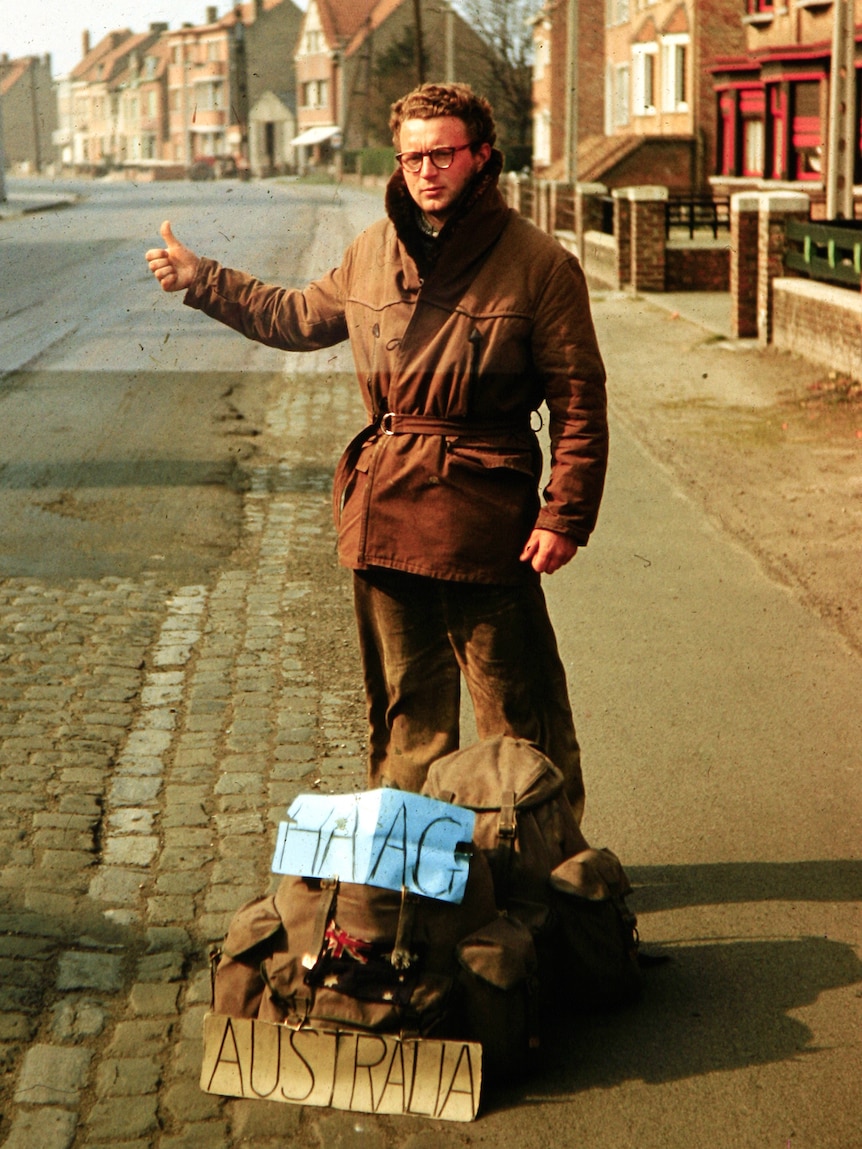 A young man hitchhiking in Europe, 1958.