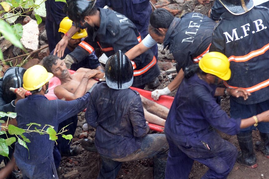 Survivor rescued from rubble of Mumbai building collapse