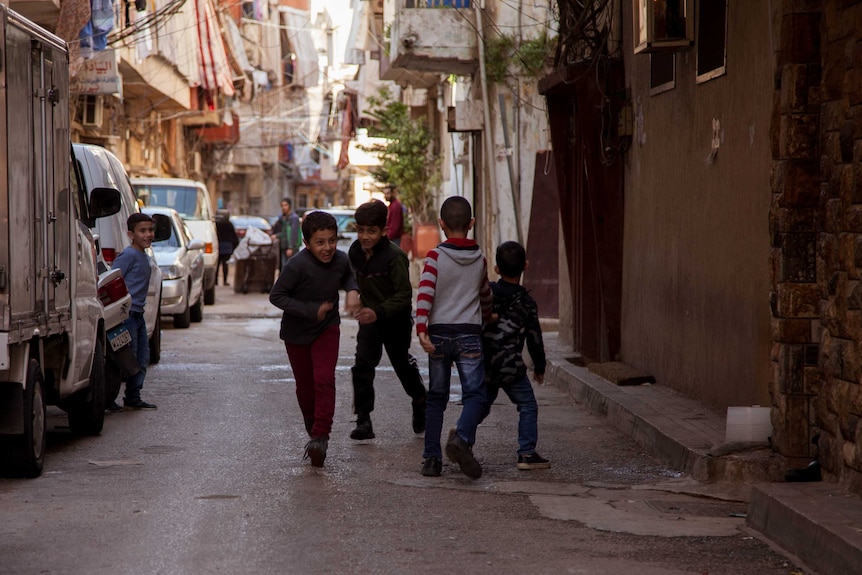 Kids play in the streets in Lebanon.