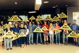 Farmers gather at Tamworth Airport ahead of Premier Mike Baird's arrival. February 2015.