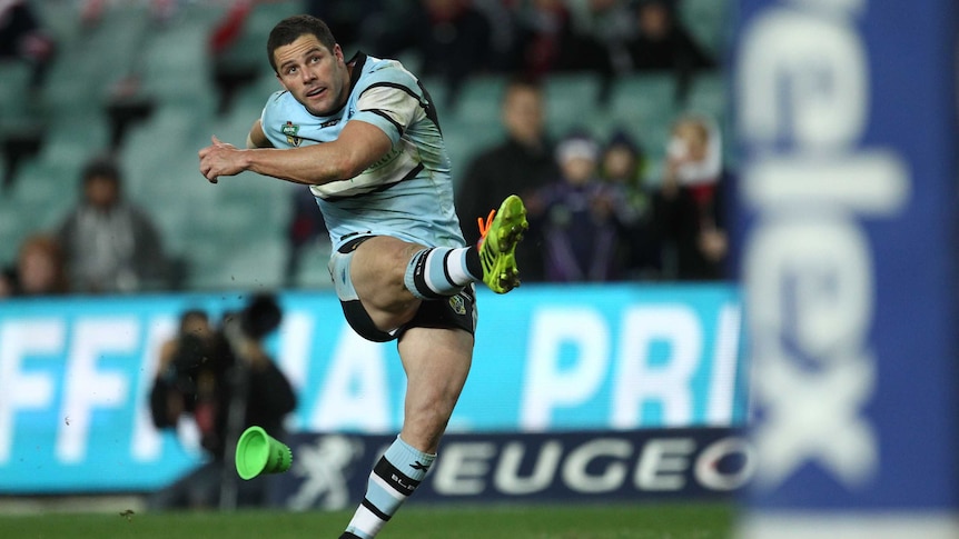 Sharks player Michael Gordon kicks a goal in round 17, 2014 against Sydney Roosters.