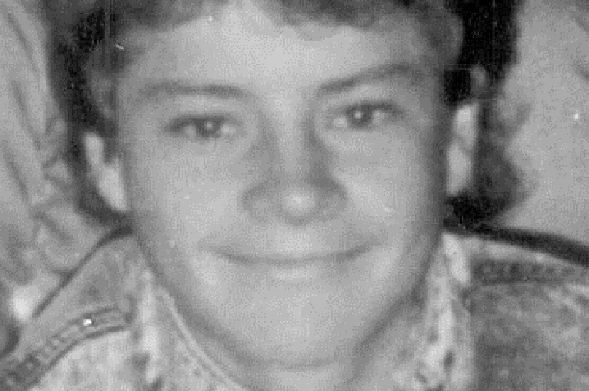 A black and white image of a similing Robby-Jo Coulter