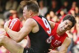 Goddard bumped to ground by Suns defence