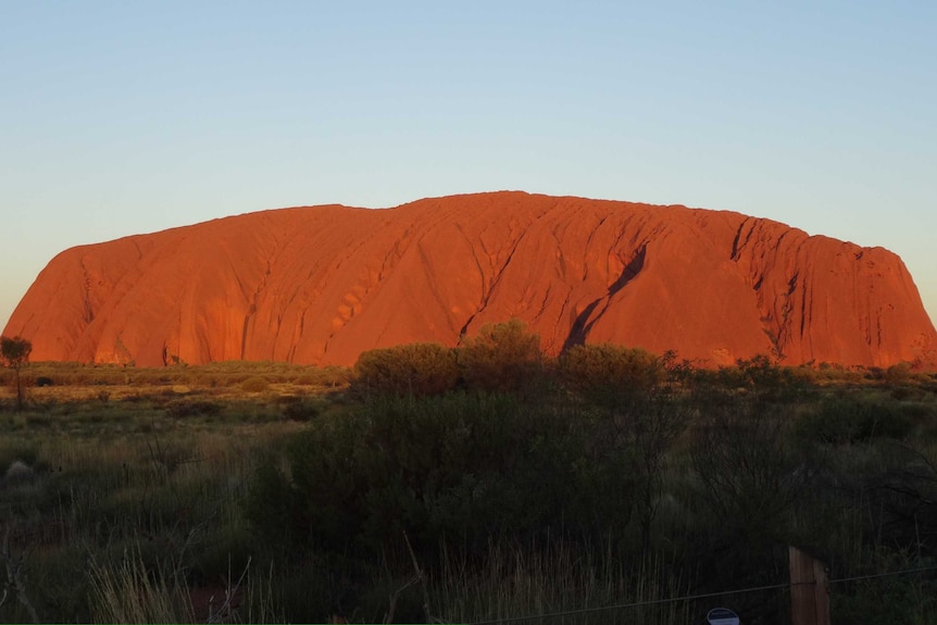 glowing red of Uluru at sunset
