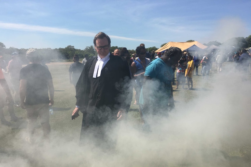Justice North during a smoking ceremony at the James Price Point native title determination.