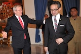 Mr Rudd (L), with Indonesian foreign minister Marty Natalegawa, is urging the adoption of a regional cooperation agreement on processing asylum seekers.