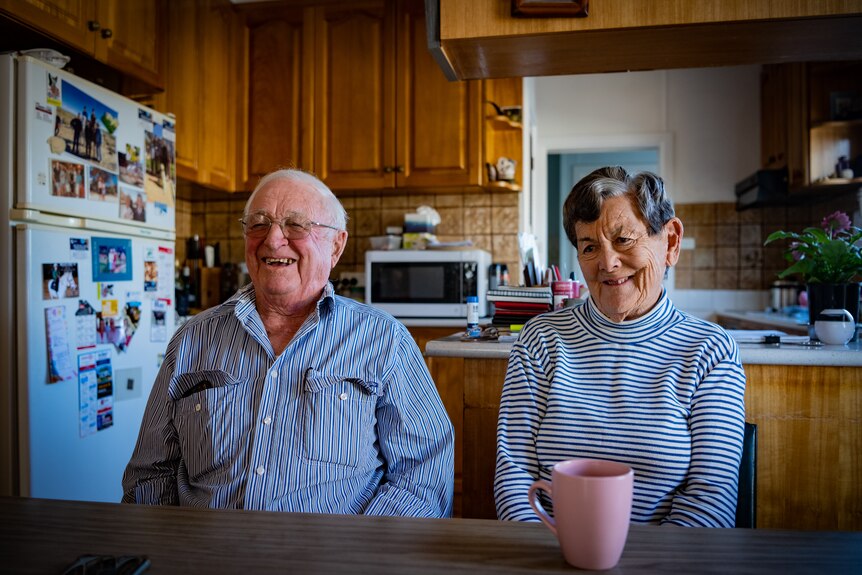 An older couple in the kitchen of a home