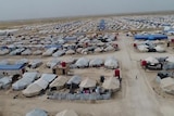 An aerial shot of a large refugee camp.
