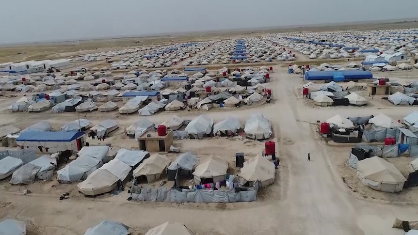 An aerial shot of a large refugee camp.